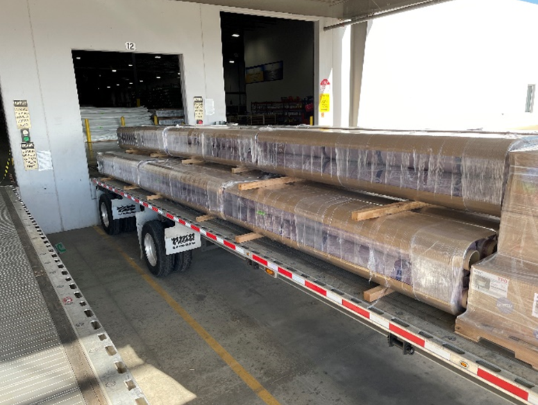 Wrapped membrane rolls stacked in 4-pack configurations